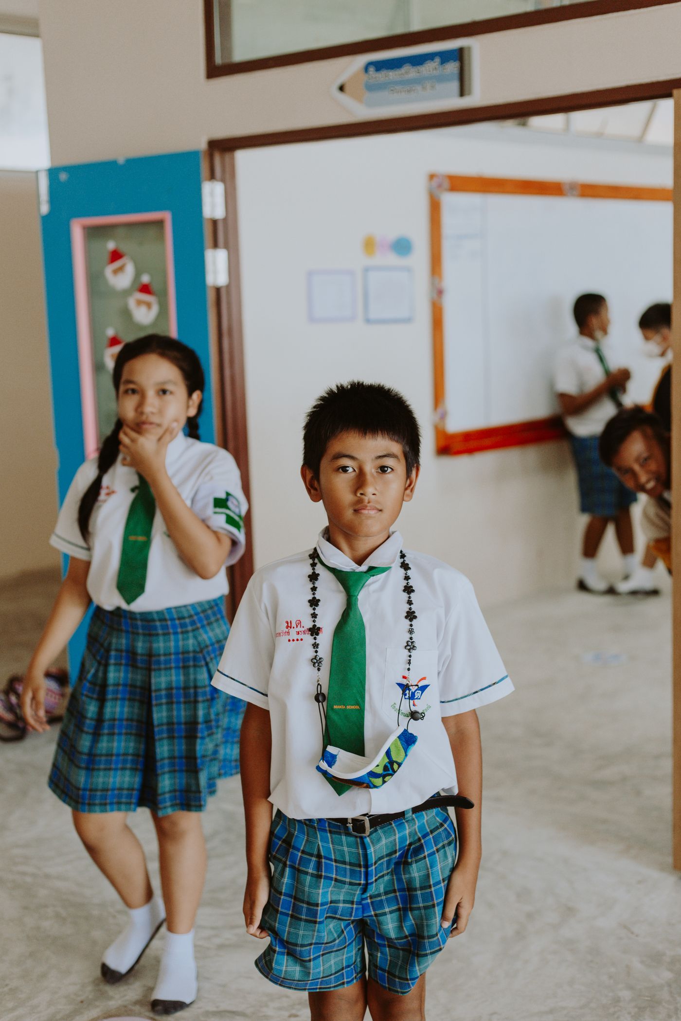 Children wearing school uniforms at school